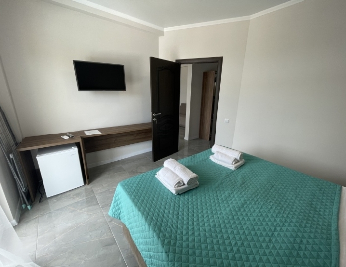 Четырёхместный люкс с балконом - Отель «Бугенвиллея» Пицунда